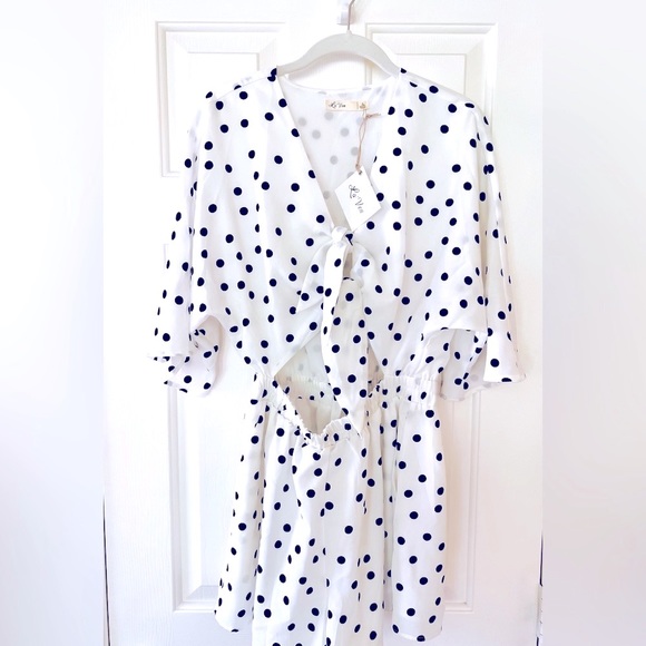 Super Cute! Never worn. Key-hole, cut out, romper with tie closure. $40 - Picture 3 of 4